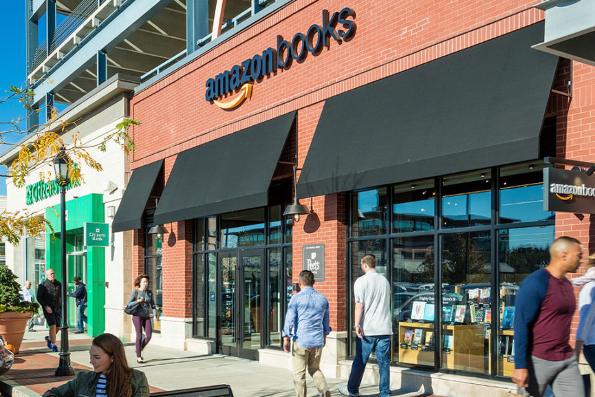 The Amazon Books store front with people walking on the sidewalk outside