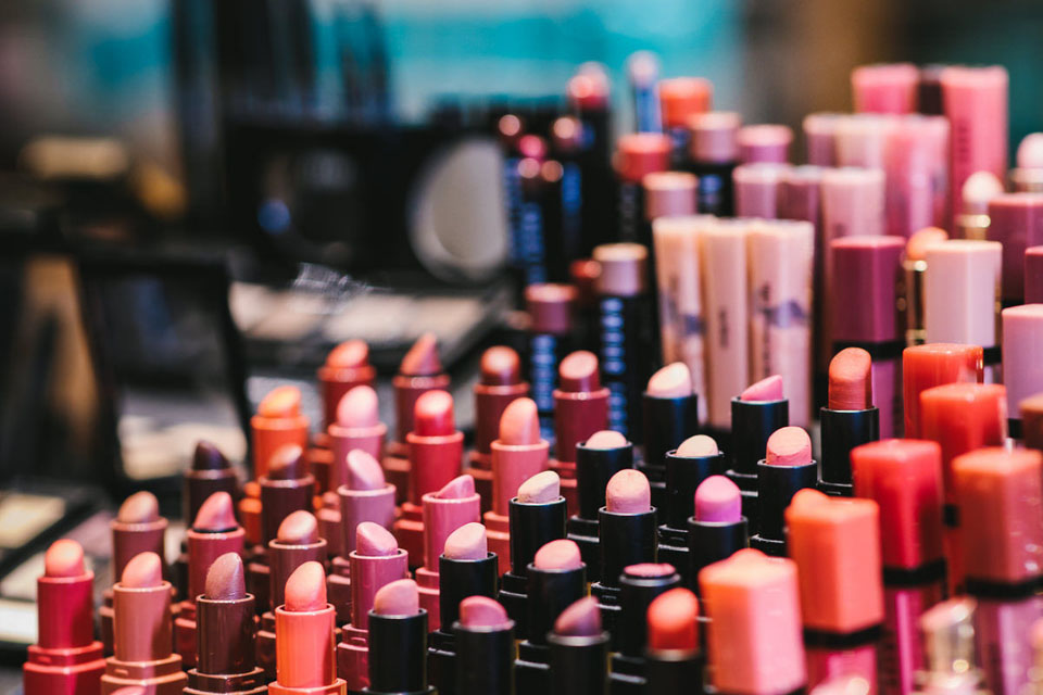 Cosmetic products neatly arranged on a counter top