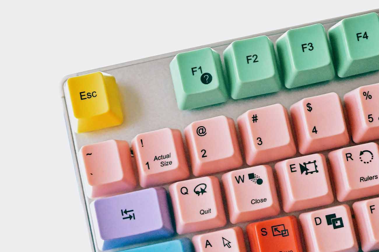 A computer keyboard with colorful keys